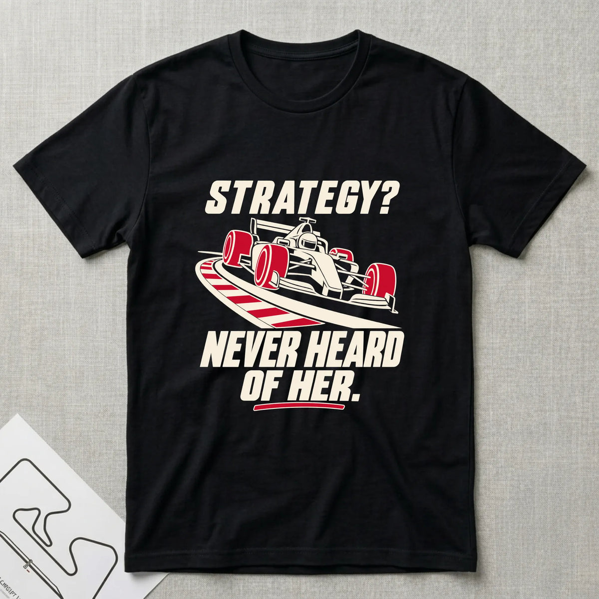 Strategy - Never Heard of Her T-Shirt - Motorsport-inspired graphic tee by Apex Paddock